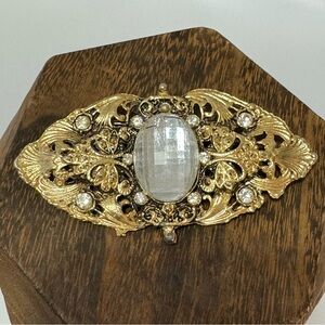 Large gold tone Hollywood Regency brooch pin clear rhinestones